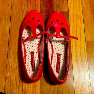 Red dressy flats in vegan leather